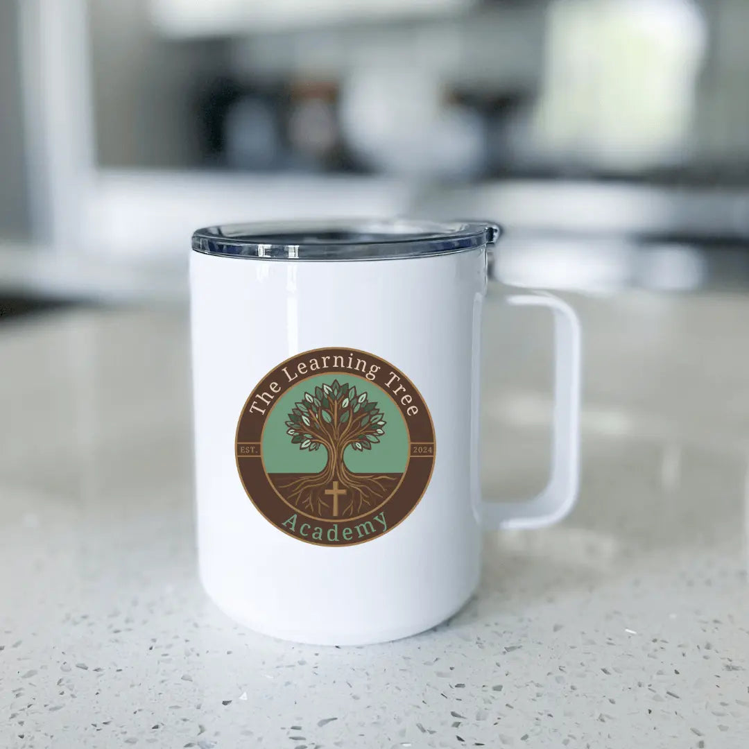 13oz metal tumbler with The Learning Tree Academy logo, featuring a sleek design by Winks Design Studio, LLC.