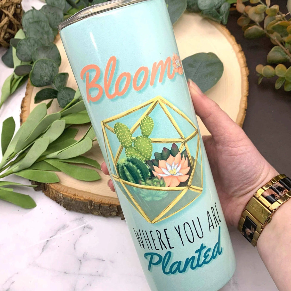 Winks Design Studio LLC peach terrarium insulated tumbler with lid and straw, showcasing a vibrant, eco-friendly drink container.
