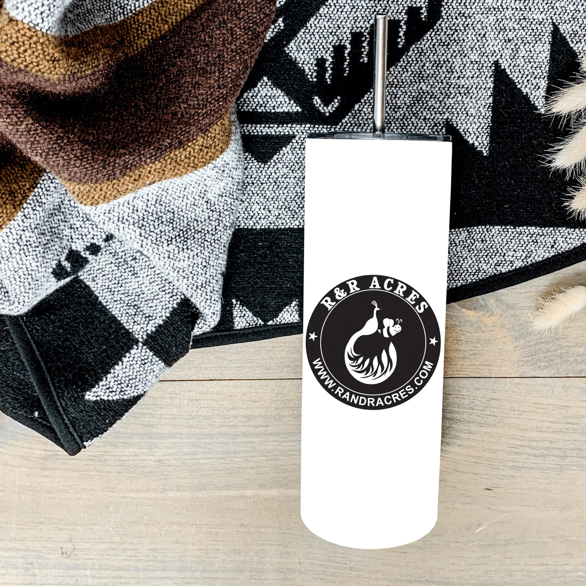 Winks Design Studio LLC R & R 20oz tumbler with multiple stylish designs, durable stainless steel construction, and spill-proof lid.