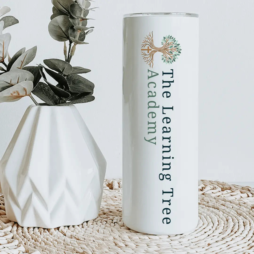 The Learning Tree Academy 20oz tumbler by Winks Design Studio, LLC, showing a sleek stainless steel design with custom logo.
