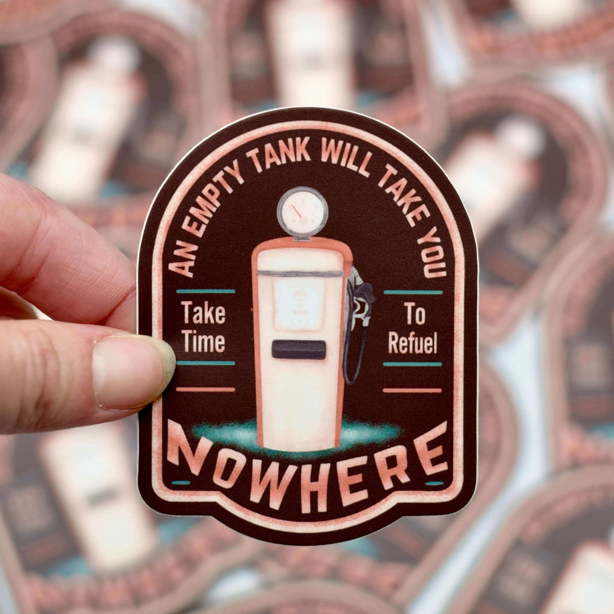 Vinyl sticker featuring the phrase "An Empty Tank Will Take You Nowhere" by Winks Design Studio, LLC, with a simple design.