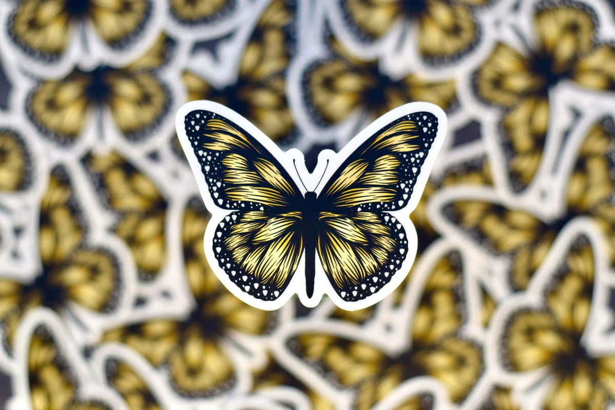 Boho Monarch Butterfly vinyl sticker by Winks Design Studio, LLC, featuring colorful butterfly design on glossy surface.