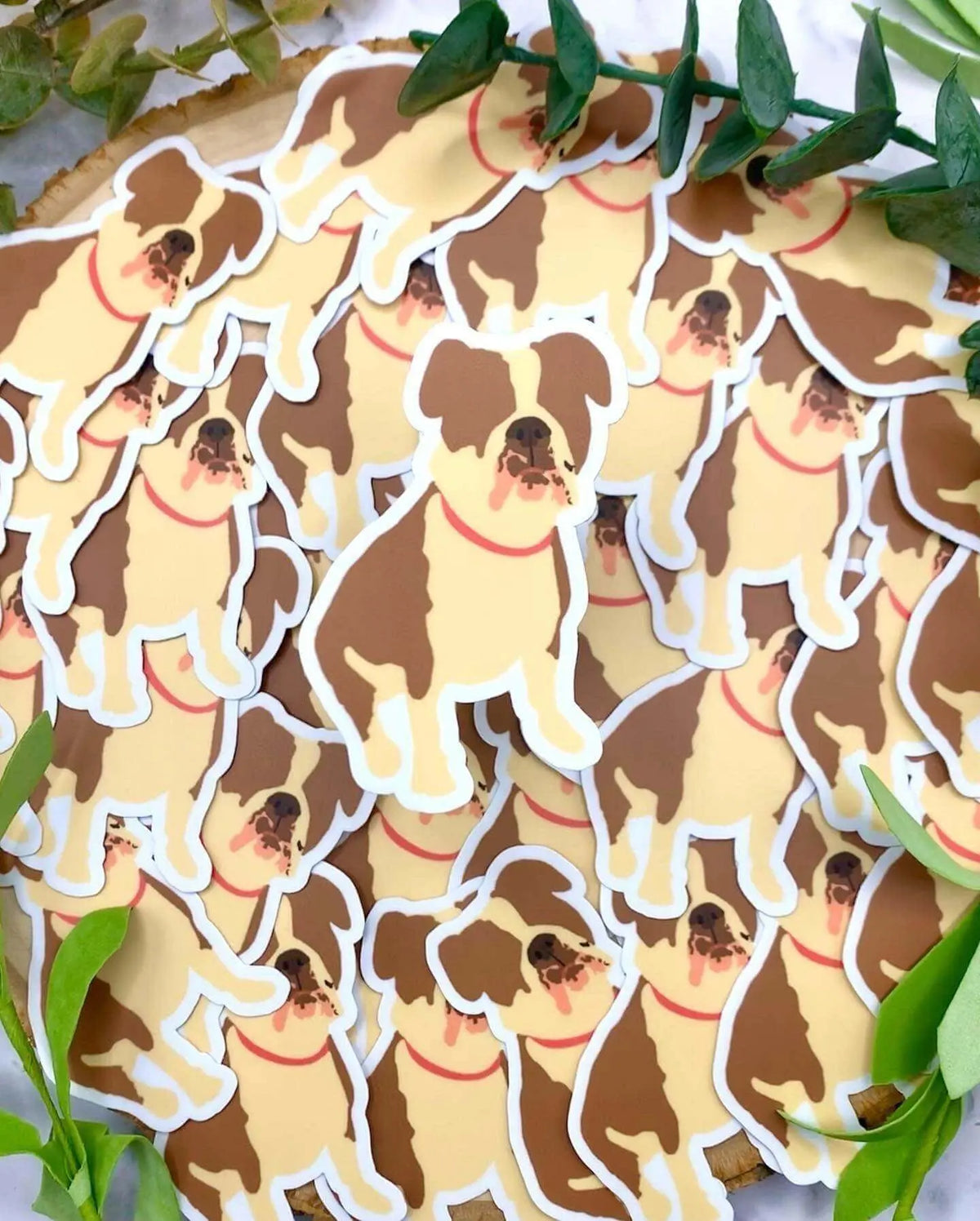 Dog-shaped Bulldog vinyl sticker from Winks Design Studio LLC, featuring detailed design on durable adhesive vinyl material.
