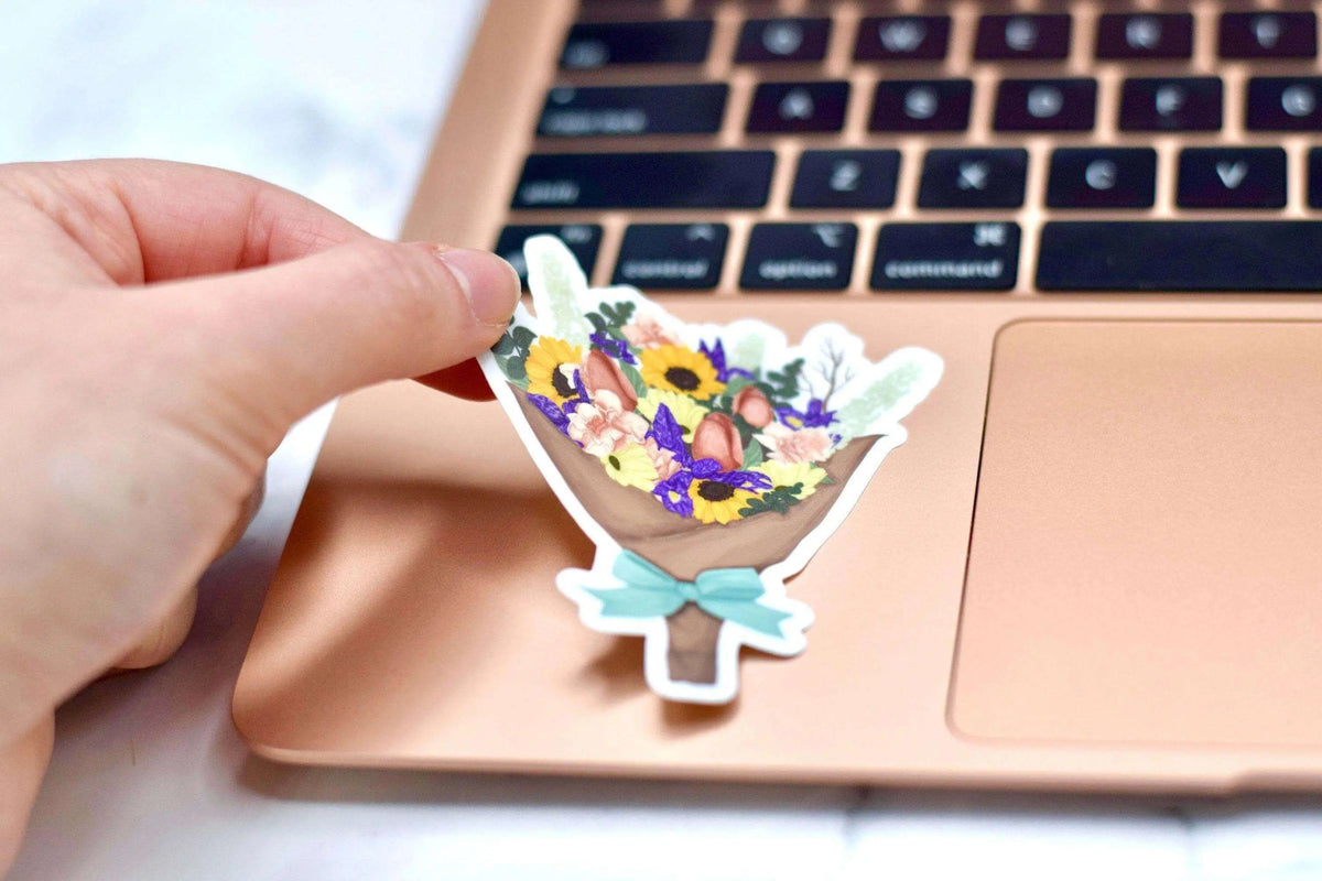 Vinyl flower bouquet sticker by Winks Design Studio LLC featuring colorful, detailed floral design on a clear background.