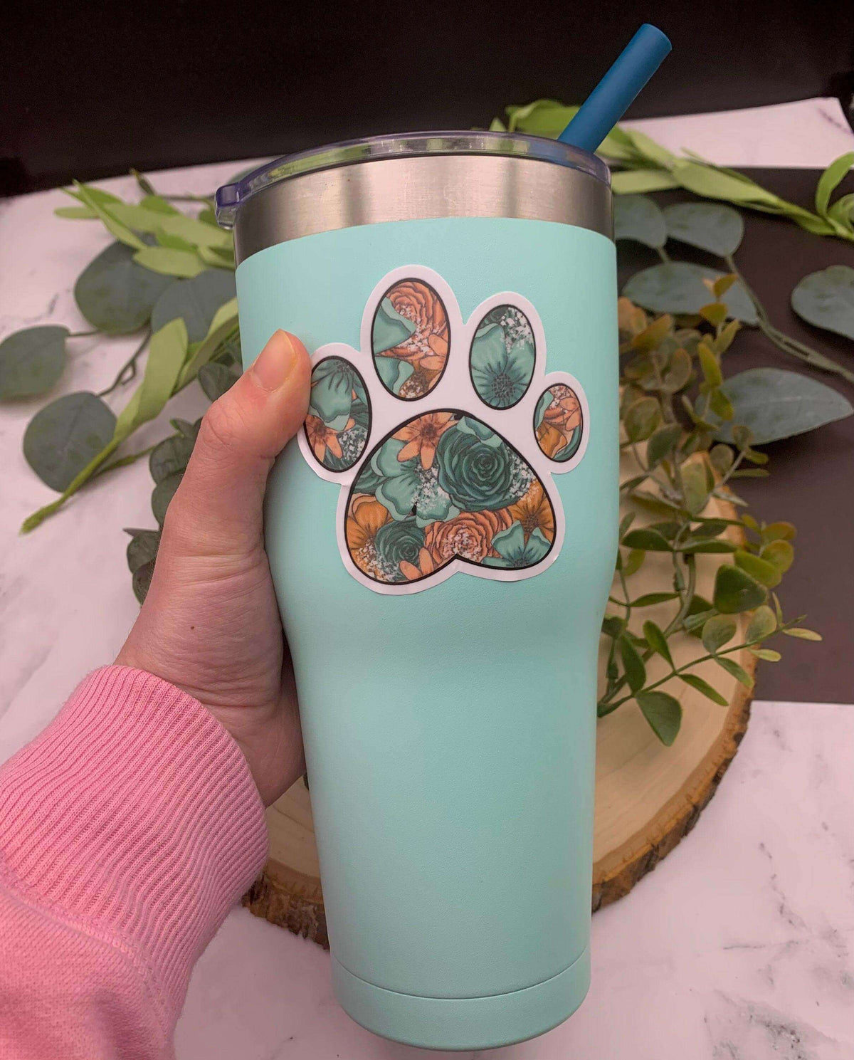 Vinyl paw print sticker from Winks Design Studio, LLC, 3x3 inches, featuring a realistic paw print design on a white background.