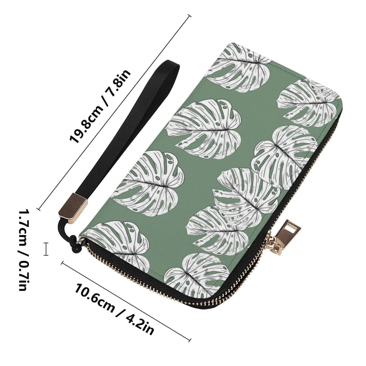Green Monstera leaves clutch wallet with wristlet from Winks Design Studio, LLC, featuring tropical leaf pattern on fabric.