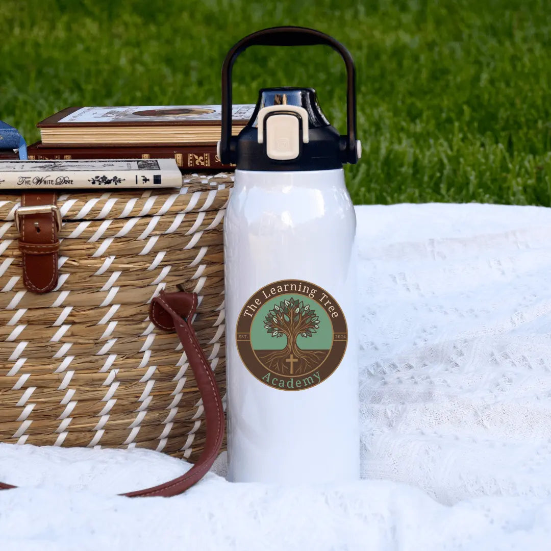 Winks Design Studio LLC The Learning Tree Academy 57oz tumbler water bottle with a colorful logo and durable stainless steel body