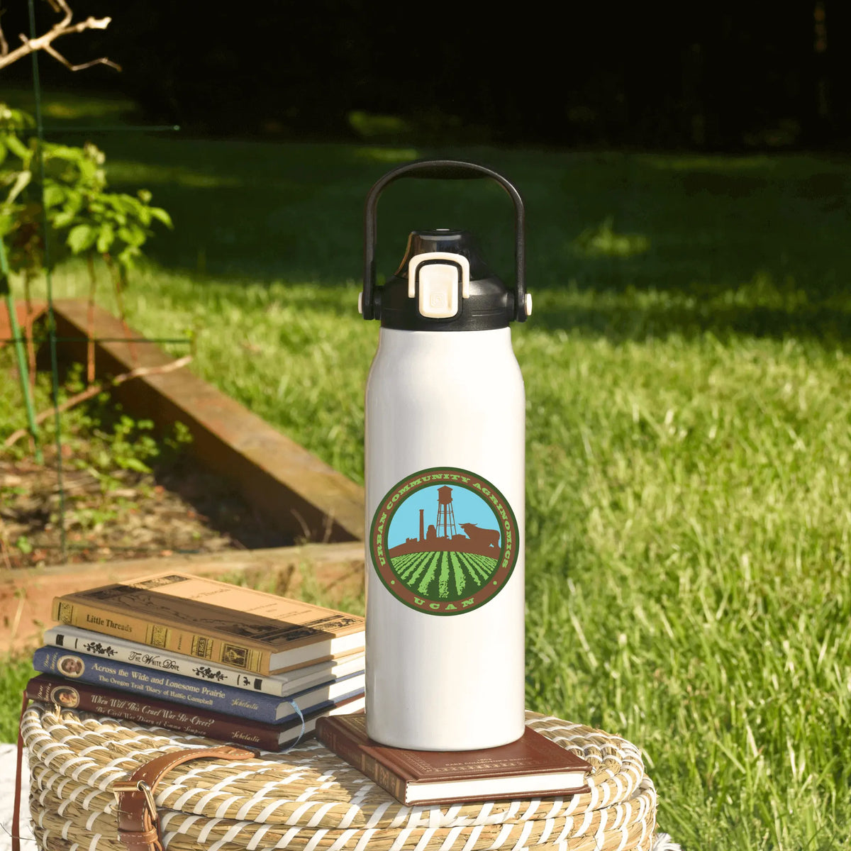 Winks Design Studio LLC 57oz water bottle with a sleek design, durable body, and secure lid for hydration on the go.