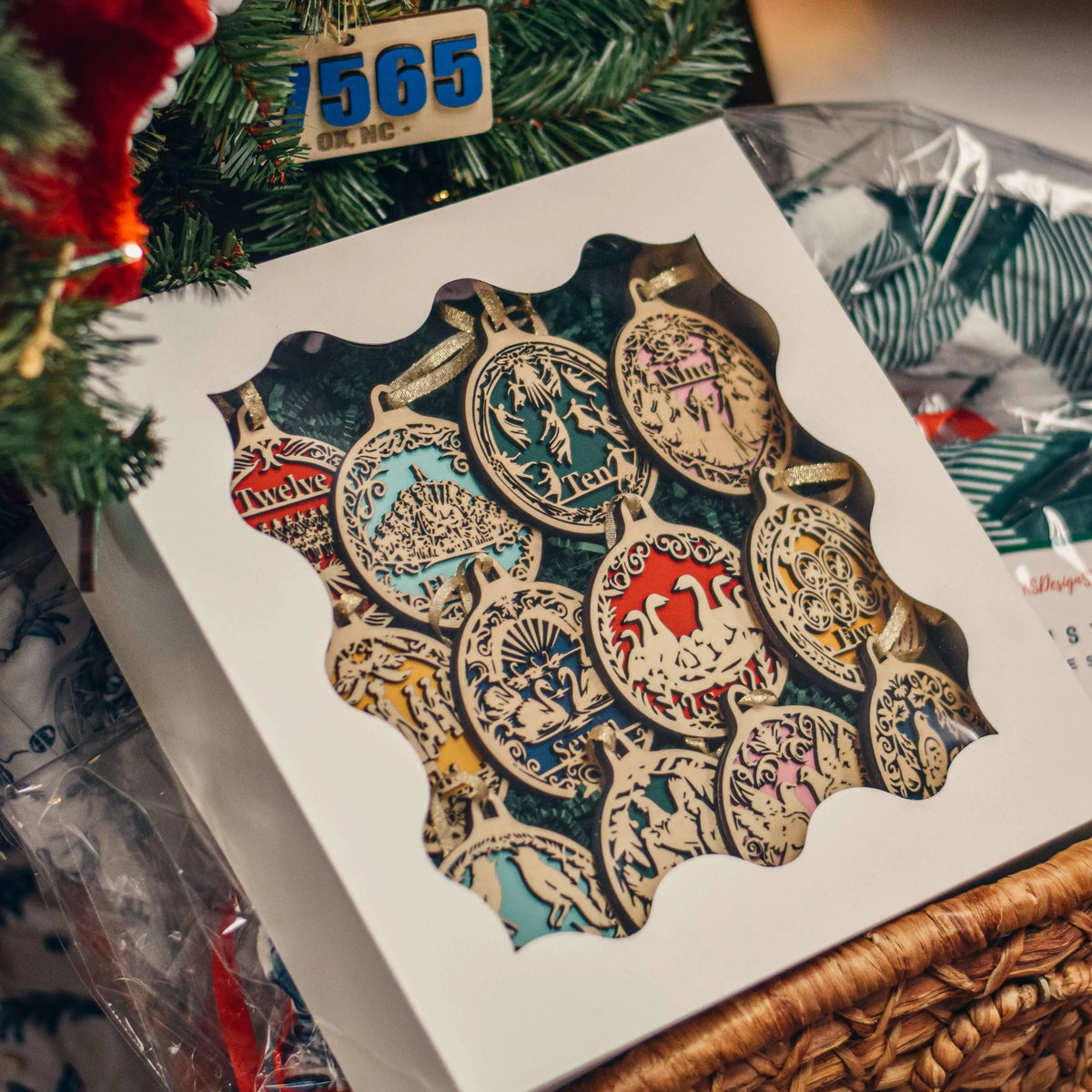 Winks Design Studio 12 Days of Christmas Ornaments workshop kit with craft supplies for creating holiday ornaments.