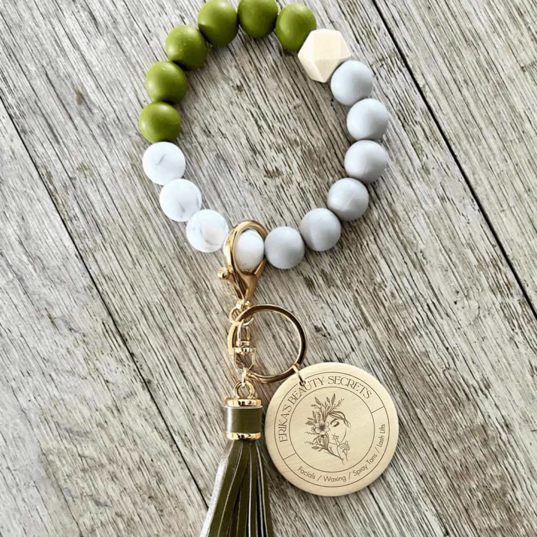 Erika's Beauty Secrets Silicone Wristlet Keychain - Winks Design Studio,LLC