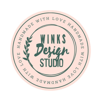 Winks Design Studio logo with "Handmade with Love" text circularly arranged around the edge.
