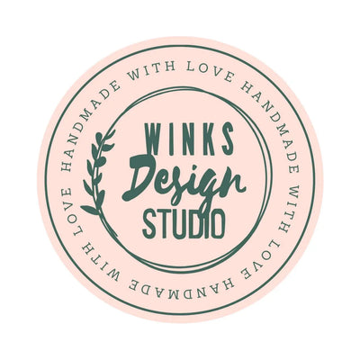 Winks Design Studio logo with "Handmade with Love" text circularly arranged around the edge.