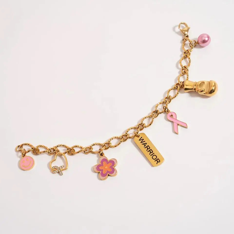 18K gold warrior charm by Winks Design Studio, LLC, featuring a detailed warrior figure on a small, polished charm.