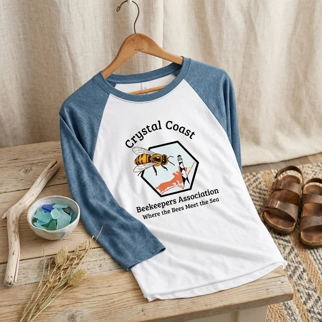 Winks Design Studio Crystal Coast Beekeepers Raglan in navy with honeybee and hive graphic, casual long-sleeve shirt for beekeepers.