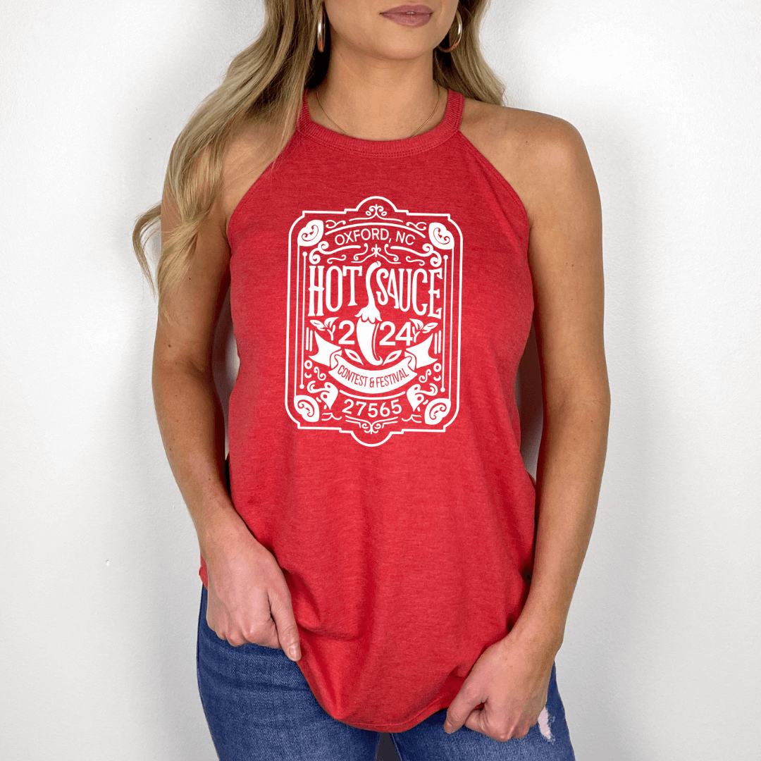 Woman wearing 2024 NC Hot Sauce Contest & Festival red halter tank top with vintage label design