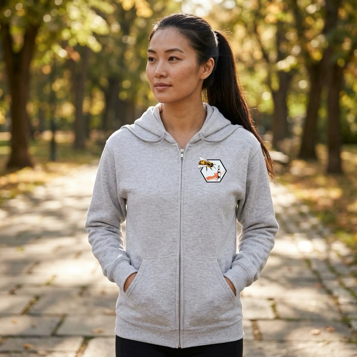Crystal Coast Beekeepers full zip hoodie by Winks Design Studio, LLC, featuring a front view of the cozy, stylish hoodie with a zip closure.