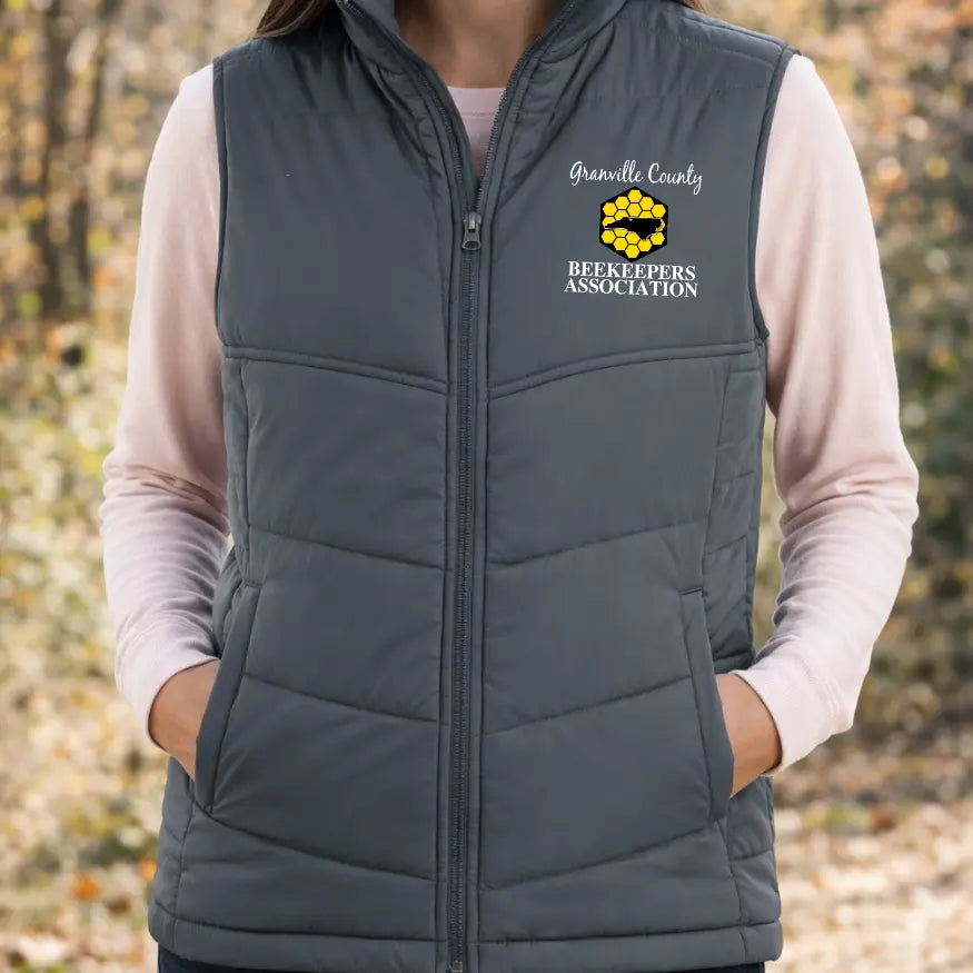Winks Design Studio GCBA Puffy Vest in team colors, lightweight with front pockets, designed for casual and athletic wear.