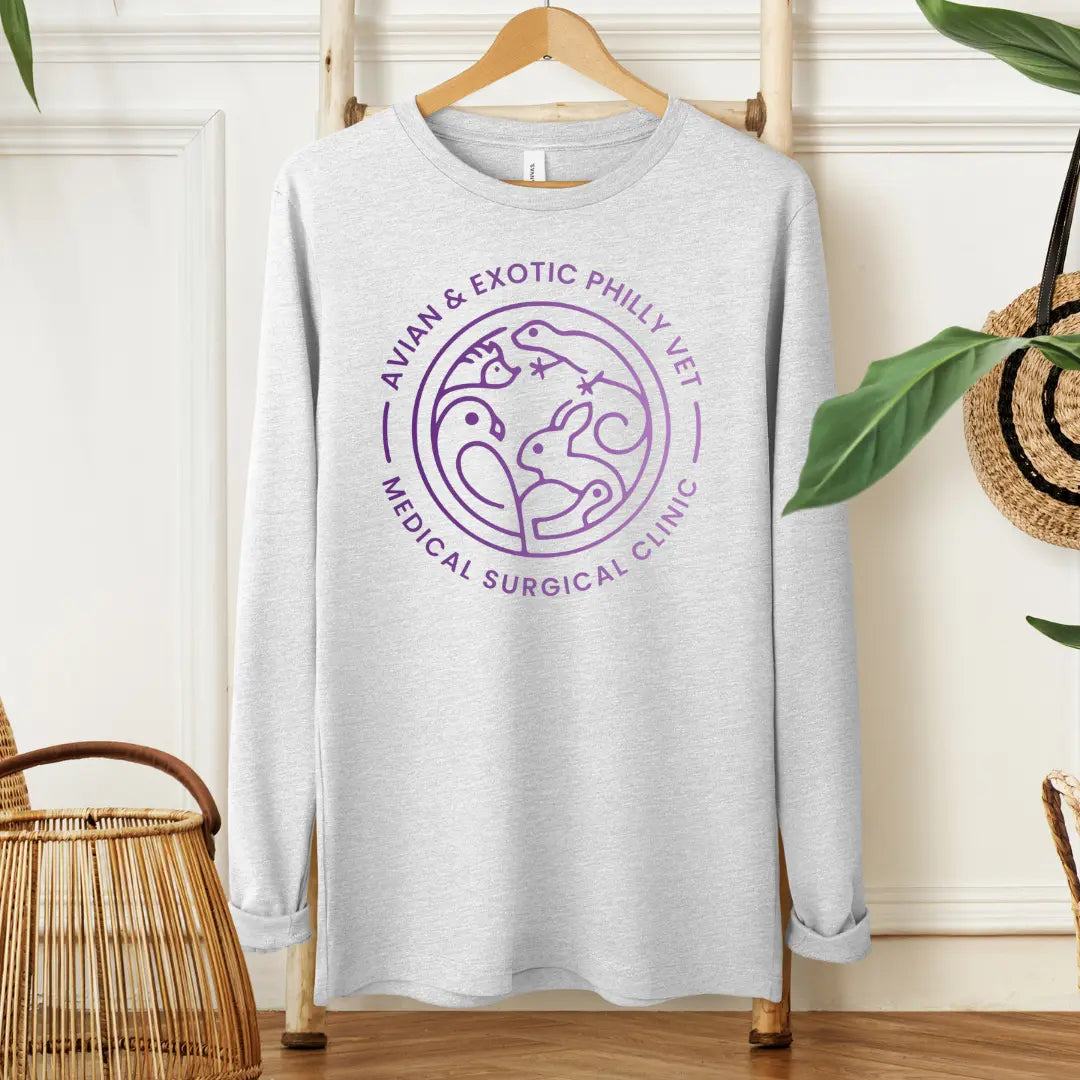 Winks Design Studio, LLC Avian Exotic long sleeve shirt featuring vibrant bird and floral patterns on soft fabric.