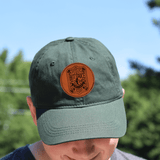 Green NC Hot Sauce Contest & Festival twill hat with vintage label design, perfect for sun protection and festival style.