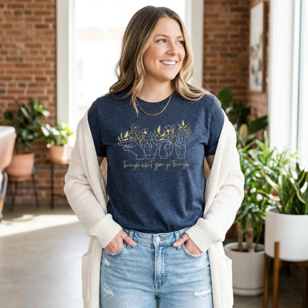 Winks Design Studio LLC Grow Through What You Go Through T-shirt featuring motivational text in casual style on soft fabric