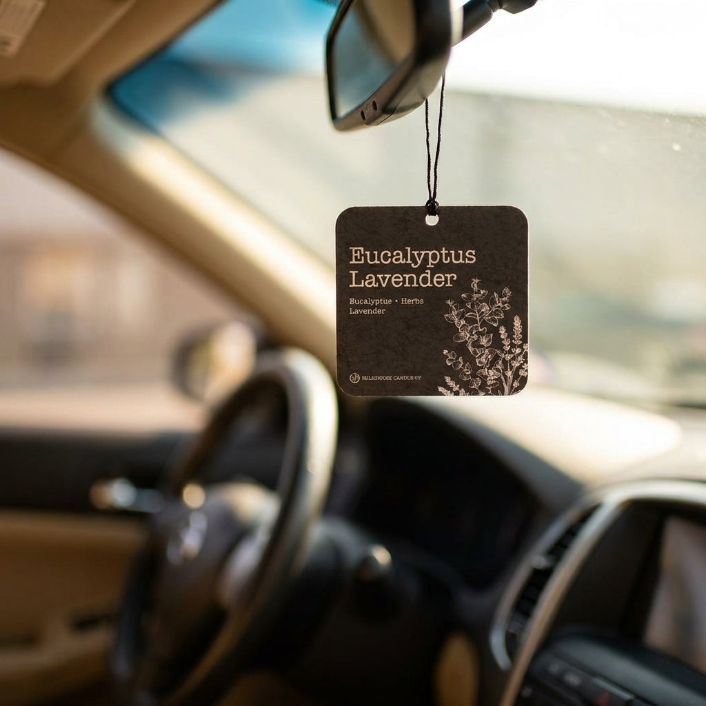 Car freshener by Winks Design Studio, LLC, with eucalyptus and lavender scent, featuring a sleek natural wood design.