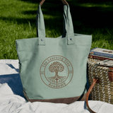 Stylish Learning Tree Academy Resort Tote on a picnic blanket, perfect for beach trips and errands.