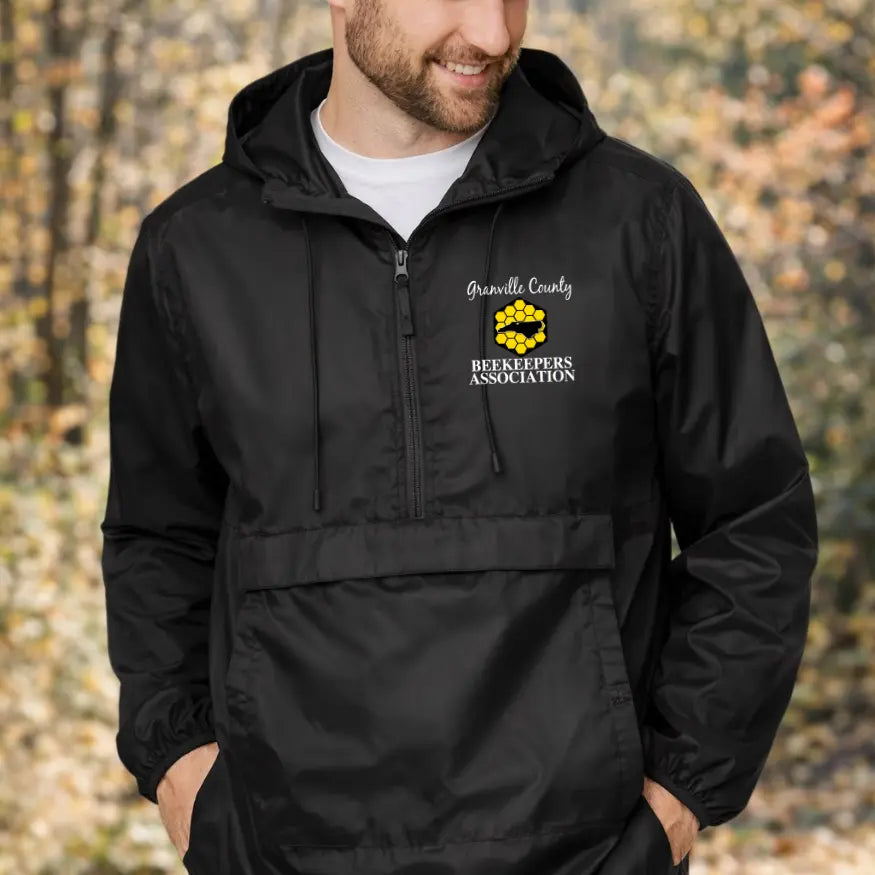 Winks Design Studio GCBA Anorak Jacket in vibrant color, lightweight outdoor apparel with a hood and zip closure.