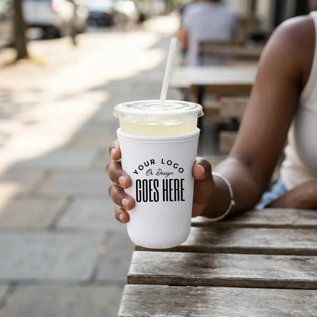 Custom neoprene cup sleeve from Winks Design Studio, LLC, featuring a snug fit and vibrant design for hot and cold beverages.