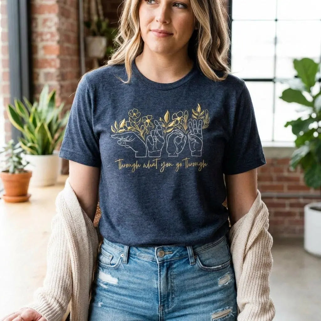 Winks Design Studio Grow Through What You Go Through T-shirt featuring motivational text in soft fabric, casual fit, and stylish design.