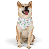 Happy dog wearing a Christmas Tree Dog Bandana with festive tree pattern for holiday cheer.