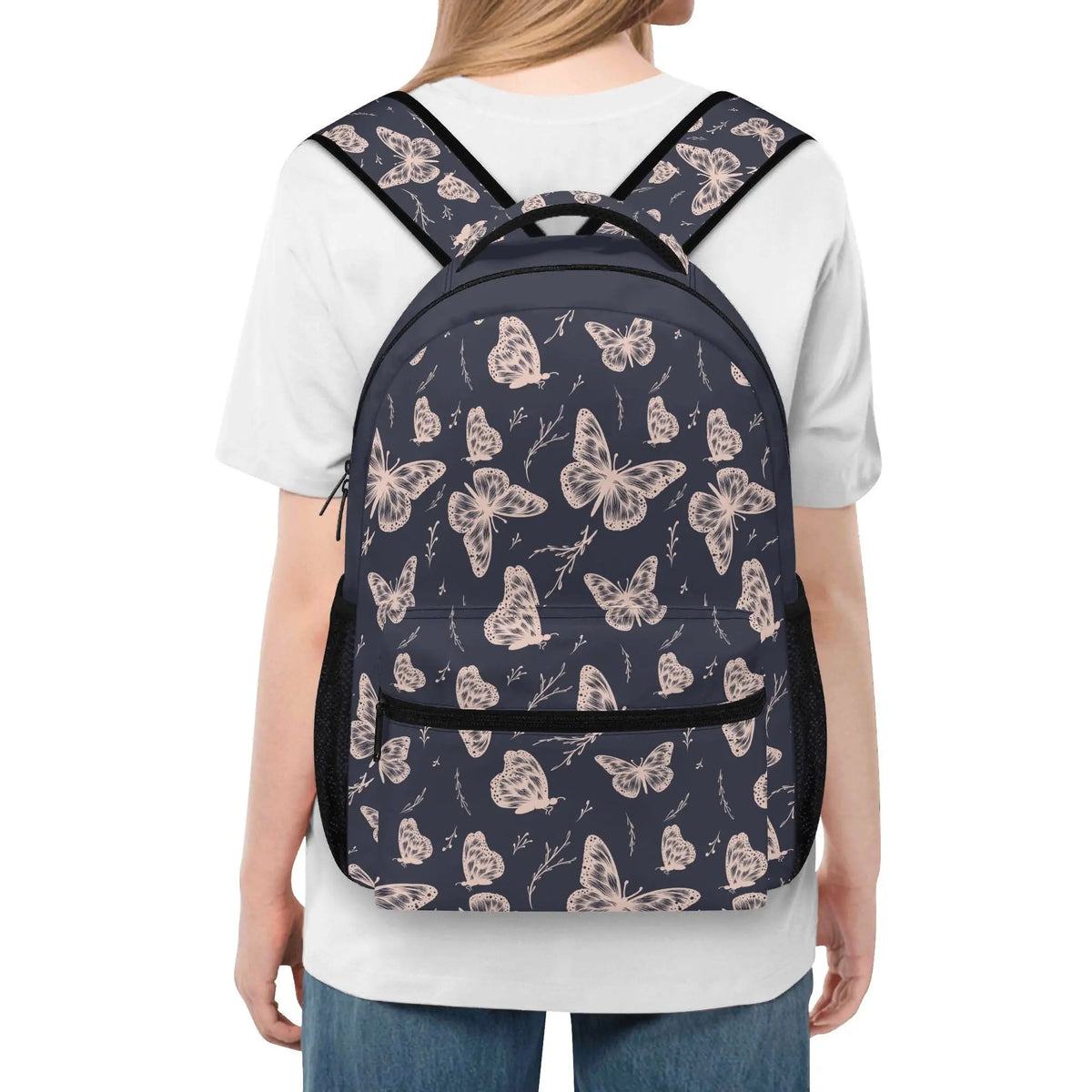 Colorful whimsical butterfly backpack by Winks Design Studio, LLC with adjustable straps and butterfly embroidery on the front.