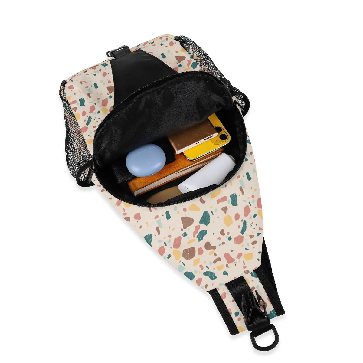 Winks Design Studio terrazzo crossbody bag with adjustable strap, featuring a colorful terrazzo pattern and compact design.