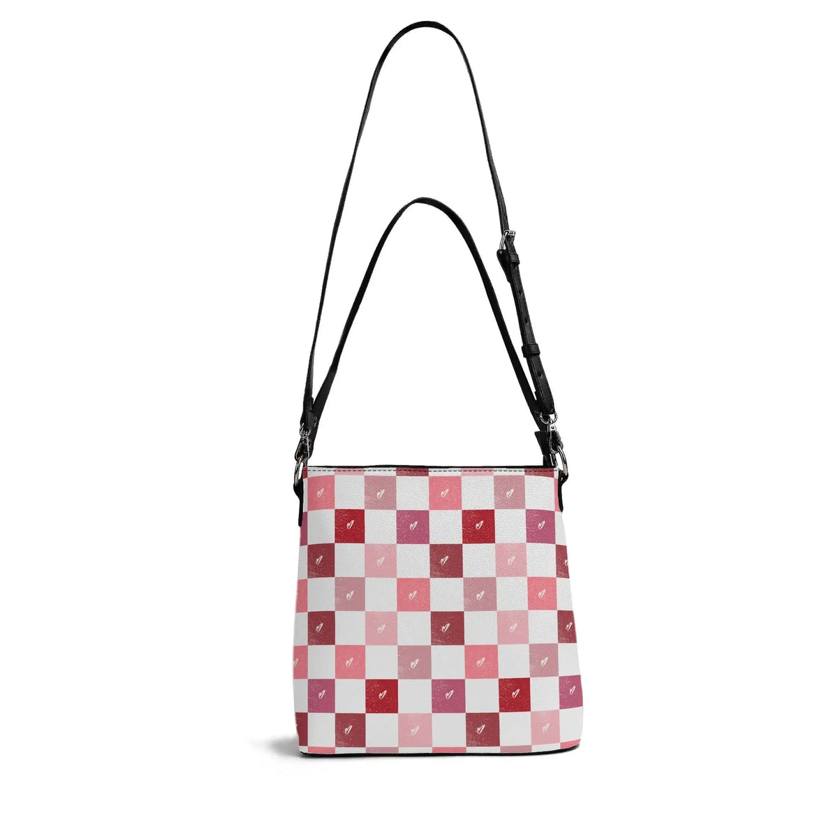 Checkerboard hearts pattern on Winks Design Studio LLC handbag with a bucket shape and adjustable strap, stylish and playful.