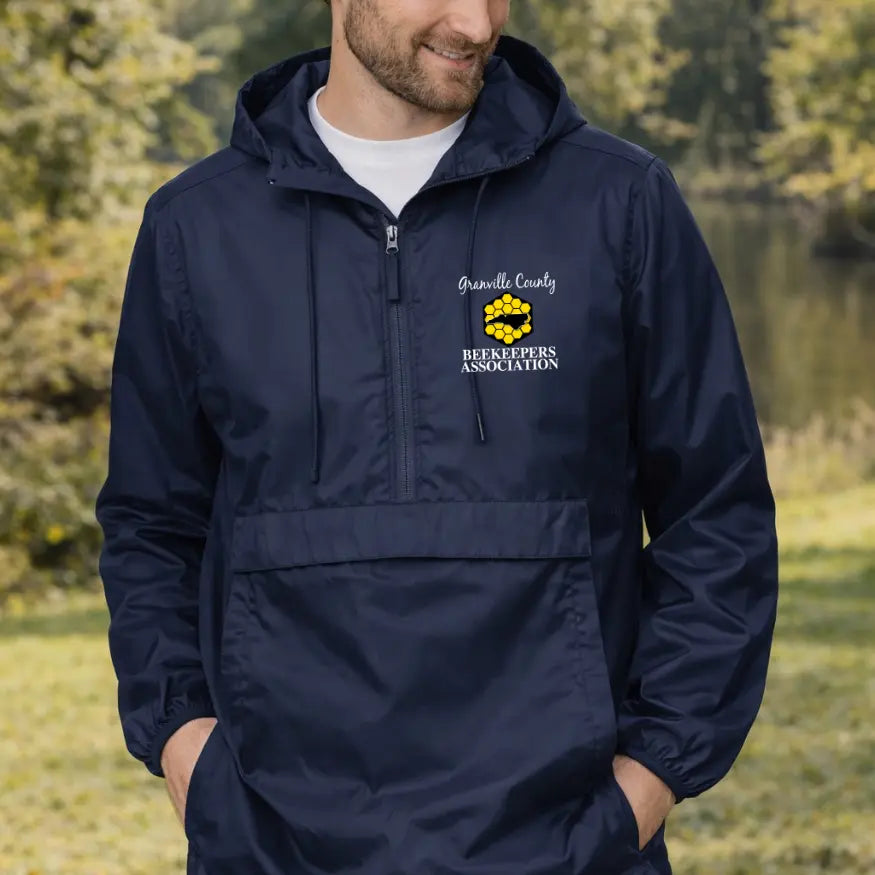 Winks Design Studio GCBA Anorak jacket in vibrant blue with a front zipper and adjustable hood, casual outdoor apparel.