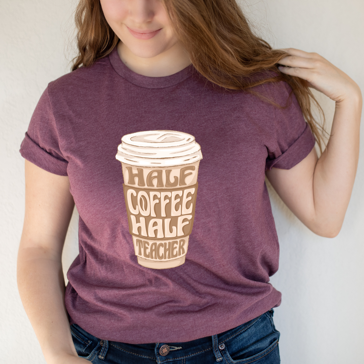Half coffee, half teacher graphic T-shirt from Winks Design Studio, featuring a fun, casual design on a comfortable shirt.