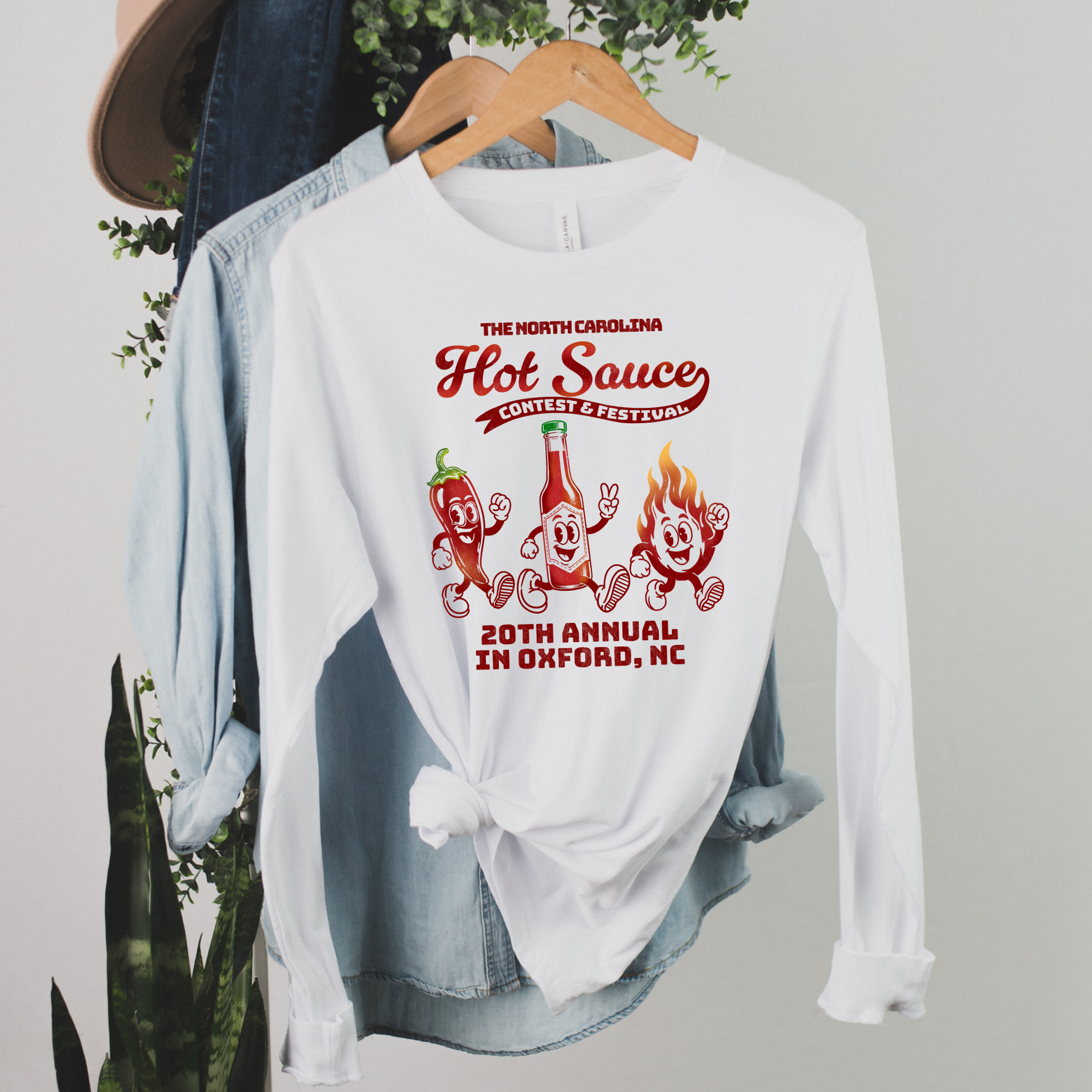 Winks Design Studio NC Hot Sauce Festival retro character long sleeve shirt with colorful vintage design and long sleeves.