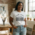White custom t-shirt with a large black "Your Logo or Design Goes Here" center chest placeholder print