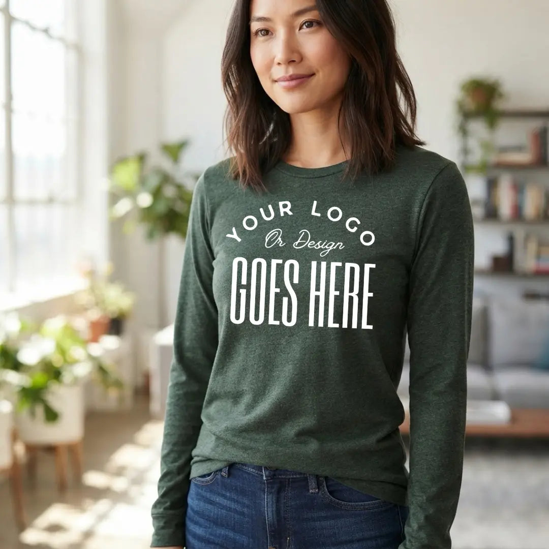 Heather forest green custom long sleeve t-shirt with a large white "Your Logo or Design Goes Here" center chest placeholder print