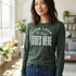Heather forest green custom long sleeve t-shirt with a large white "Your Logo or Design Goes Here" center chest placeholder print