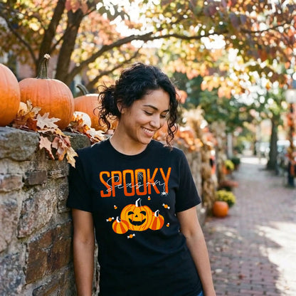 Black "Spooky Season" Halloween graphic tee with a smiling jack-o&