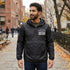 Black custom quarter zip pullover windbreaker with a white "Your Logo or Design Goes Here" left chest placeholder print