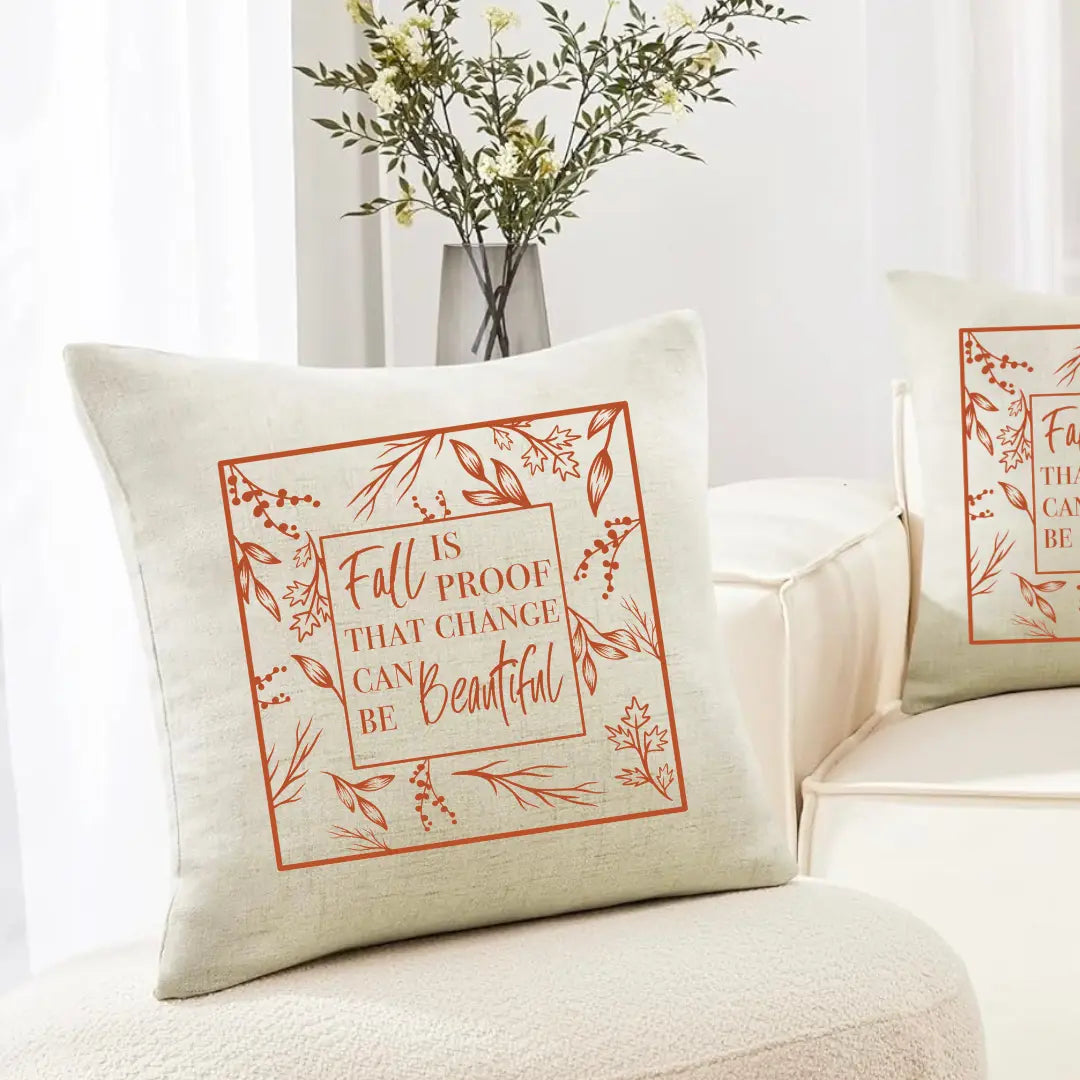Decorative fall-themed pillow by Winks Design Studio, LLC featuring the phrase "Fall Is Proof That Change Can Be Beautiful."
