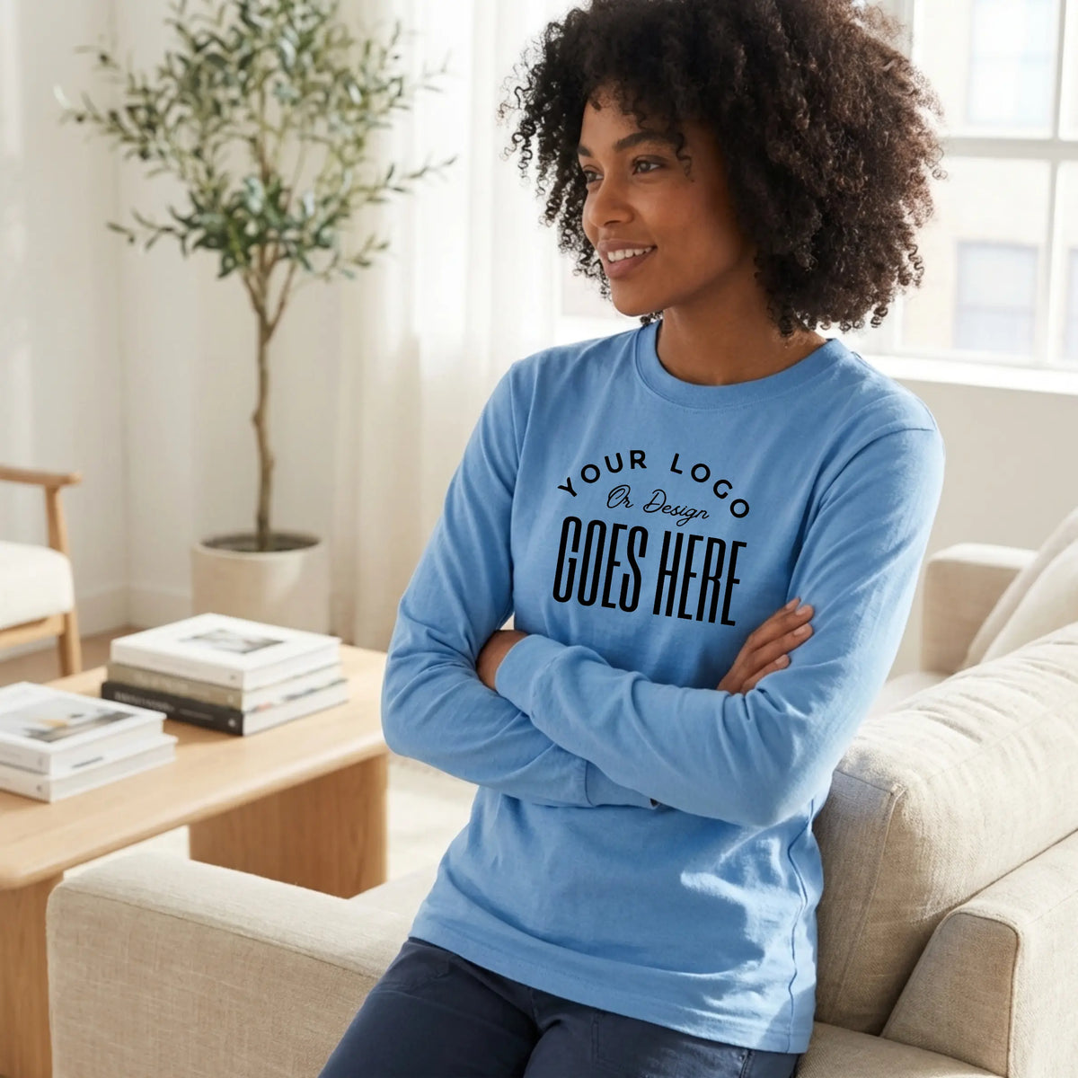 Custom Gildan 50/50 long-sleeve T-shirt from Winks Design Studio, LLC, featuring a plain white fabric with a crew neckline.