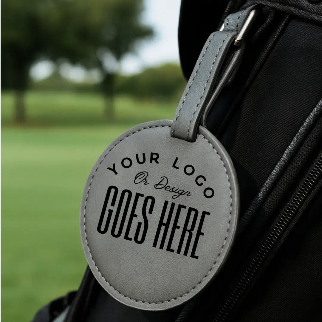 Custom engraved golf tee holder by Winks Design Studio, LLC, showing a sleek wooden tee holder with personalized engraving.