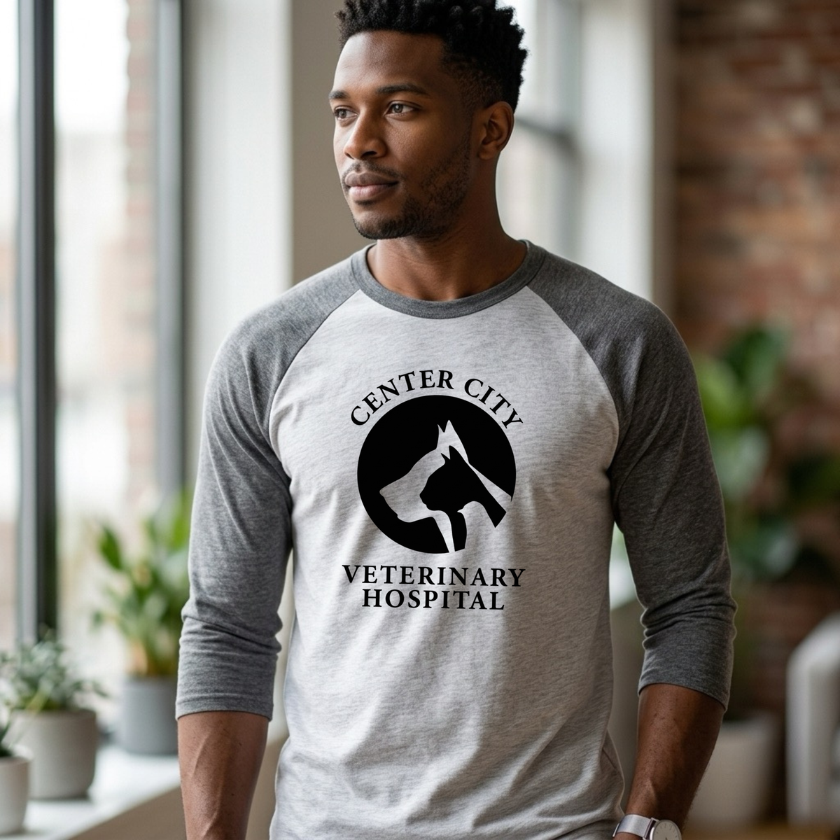 Winks Design Studio Center City Vet Raglan Baseball T-shirt featuring a casual, short-sleeve raglan style with a vet-themed graphic.