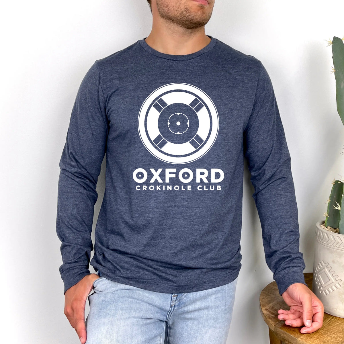 Winks Design Studio Oxford Crokinole Club long sleeve shirt featuring a classic design and comfortable fit.