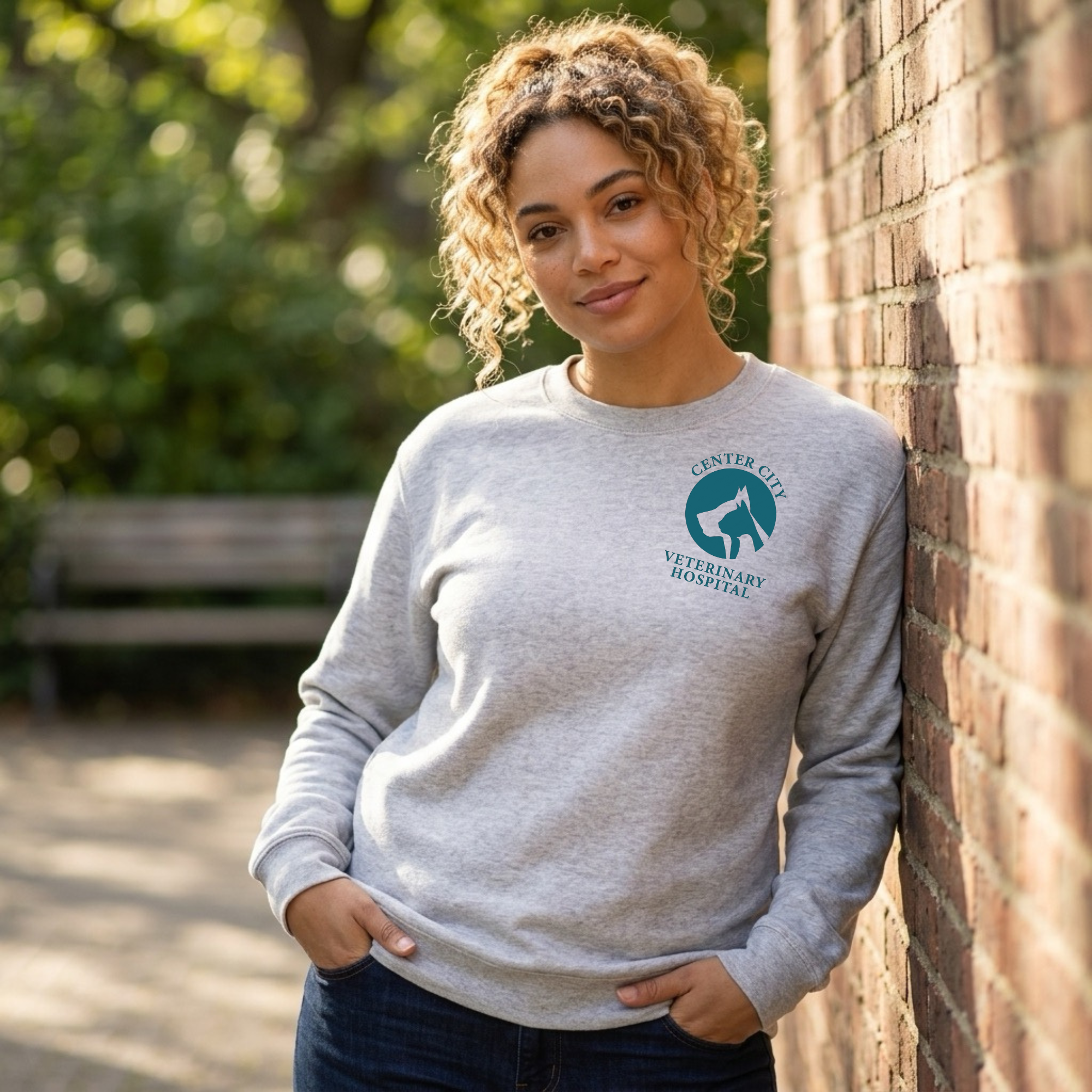 Winks Design Studio Center City Vet crewneck sweatshirt in gray with logo, casual fit, soft fabric, and ribbed cuffs.