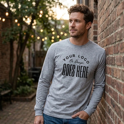 Heather gray custom long sleeve t-shirt with a large black "Your Logo or Design Goes Here" center chest placeholder print
