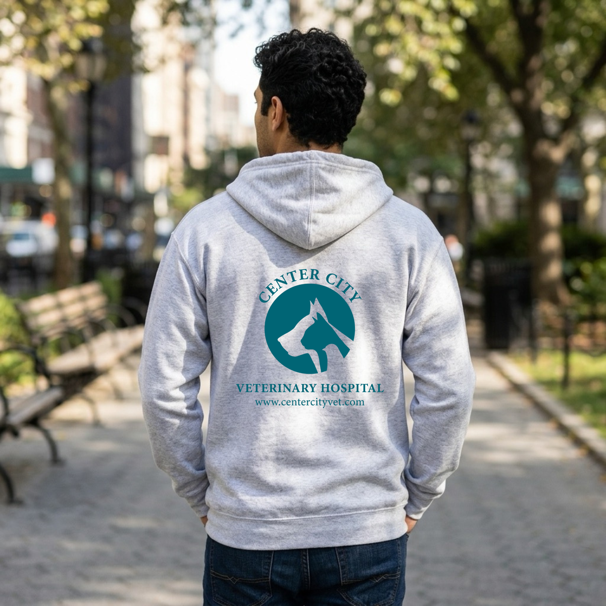 Center City Vet full zip hoodie by Winks Design Studio, LLC, showing the navy blue hoodie with front zipper and logo detail.