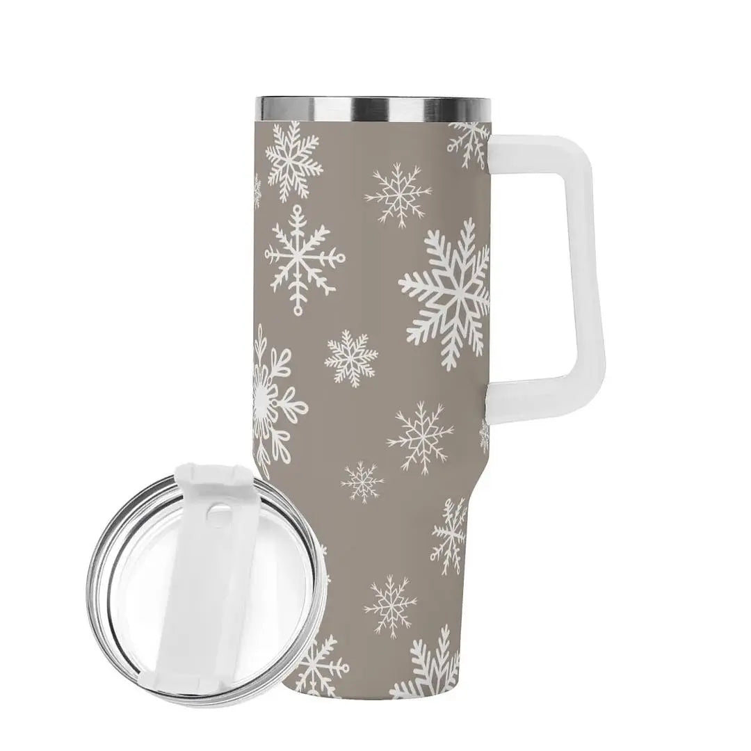 Stainless steel water bottle featuring snowflake design from Winks Design Studio, LLC, 40oz capacity with a sleek, insulated tumbler style.
